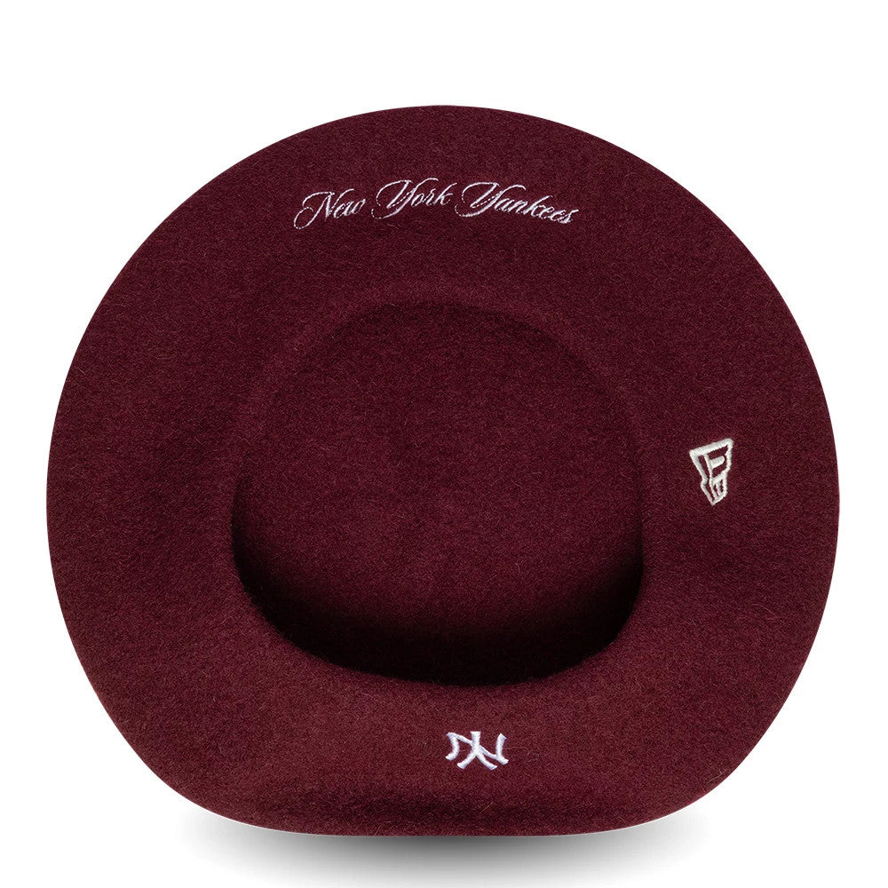 Pictured is this MLB Wool Script New York Yankees Beret in dark red. 5