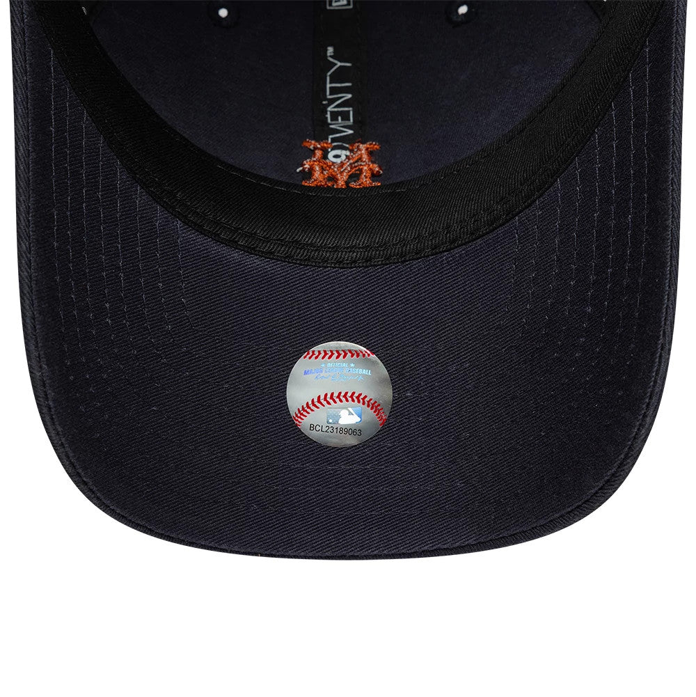 New York Mets MLB Mini Logo Navy New Era 9TWENTY Adjustable Cap, inside view showing the black sweatband and fabric taping with the 9TWENTY branding, an orange logo on the undervisor, and a baseball-themed authenticity sticker.