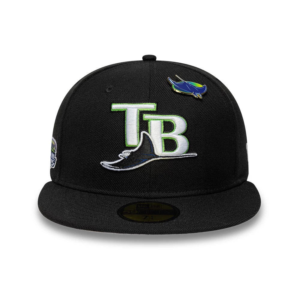 Tampa Bay Rays MLB Icon Black New Era 59FIFTY Fitted Cap, front view showing the TB Rays logo in raised embroidery on the front panel, a blue and green ray pin above the logo, and the classic gold 59FIFTY size sticker on the visor.