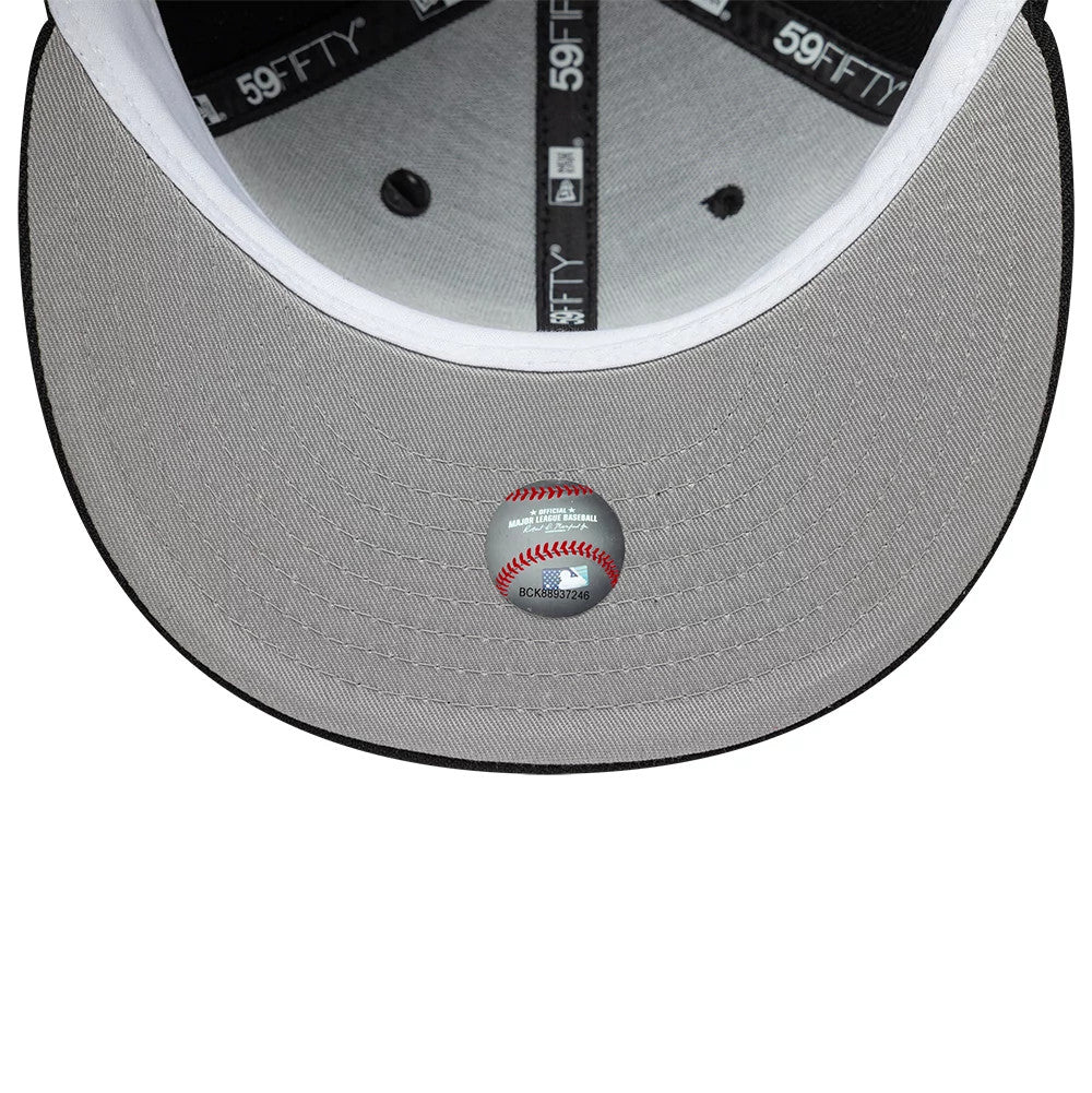 Tampa Bay Rays MLB Icon Black New Era 59FIFTY Fitted Cap, inside view showing grey undervisor with a baseball design sticker, includes black 59FIFTY brand taping and white sweatband, alongside black eyelets in the crown.