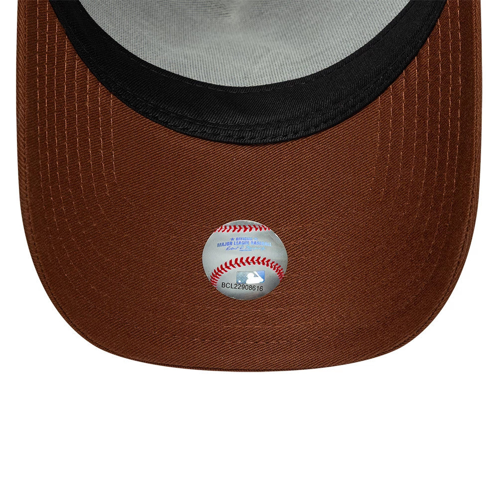 Pictured is this MLB Outline New York Yankees 9FORTY E-Frame Trucker cap in brown. 5