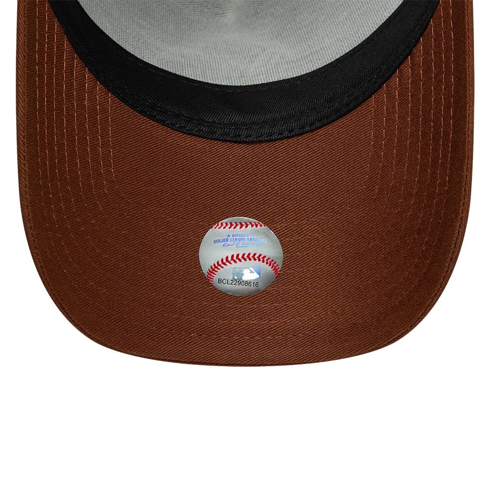 Pictured is this MLB Outline New York Yankees 9FORTY E-Frame Trucker cap in brown. 5