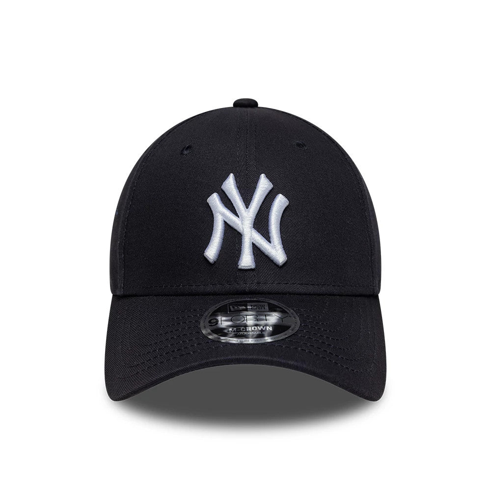 New York Yankees MLB Side Script Navy New Era 9FORTY M-Crown Adjustable Cap, front view showing the raised white embroidered NY logo on the structured navy crown, curved visor with a 9FORTY size sticker on the bill, and black top button.