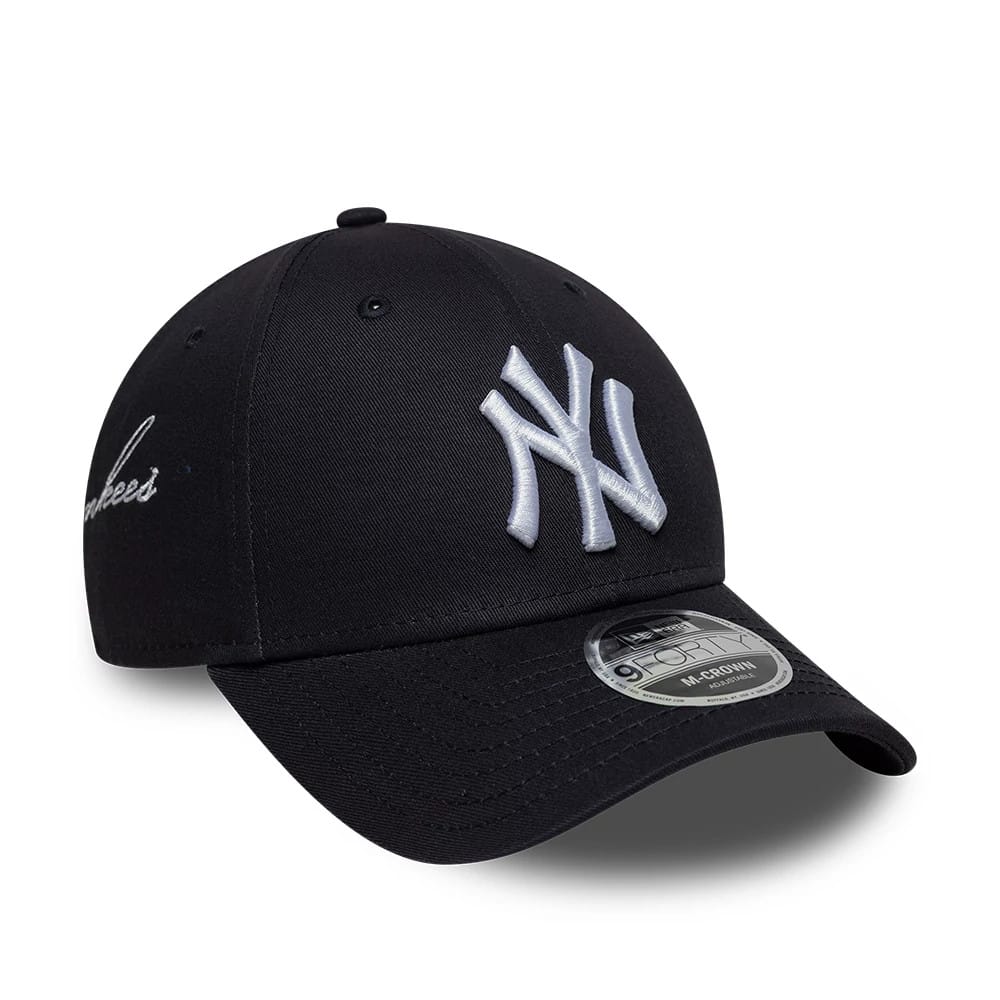 Pictured is this MLB Side Script New York Yankees 9FORTY M-Crown cap in navy. 1