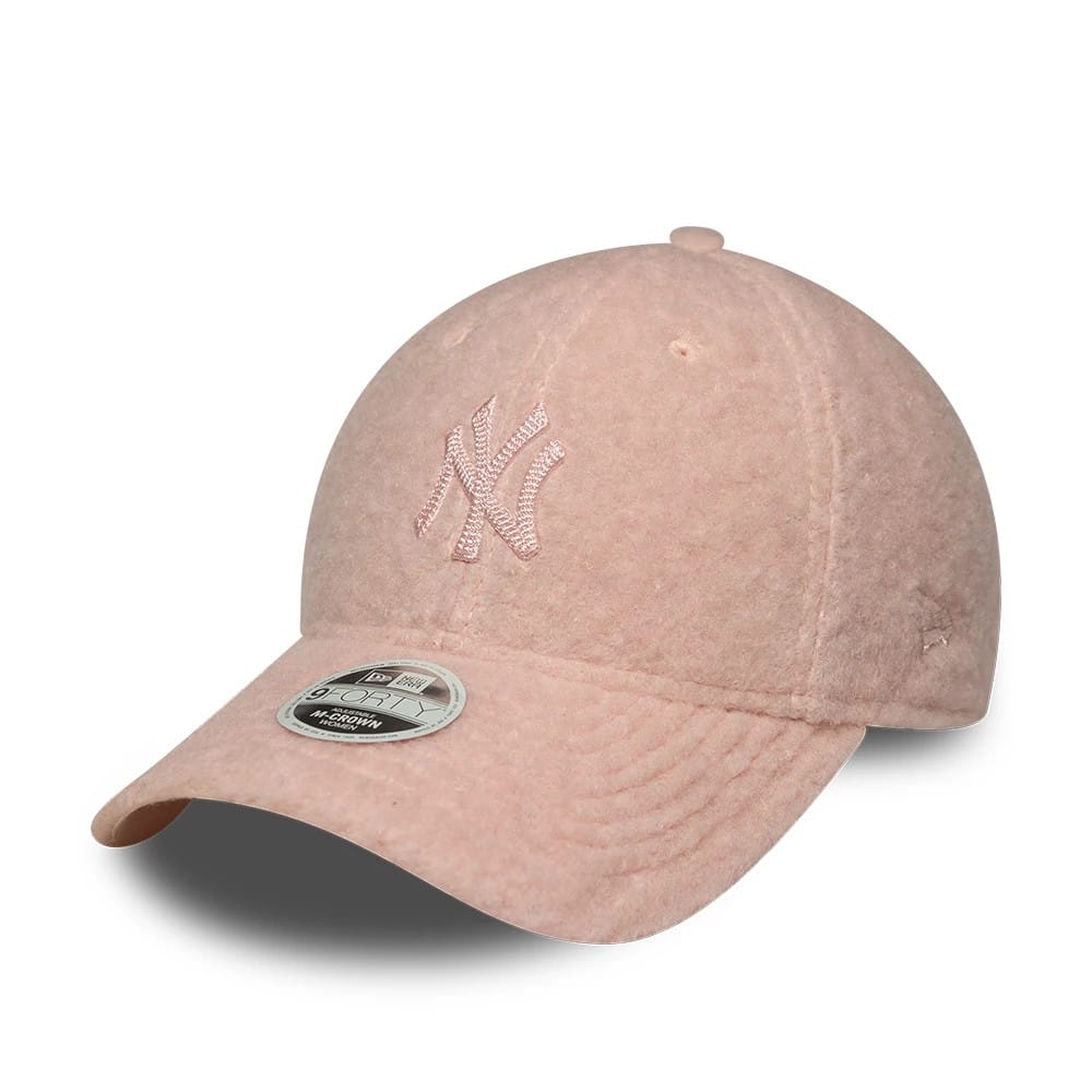 Pictured is this Womens MLB Winter Borg New York Yankees 9FORTY M-Crown cap in pastel pink. 1