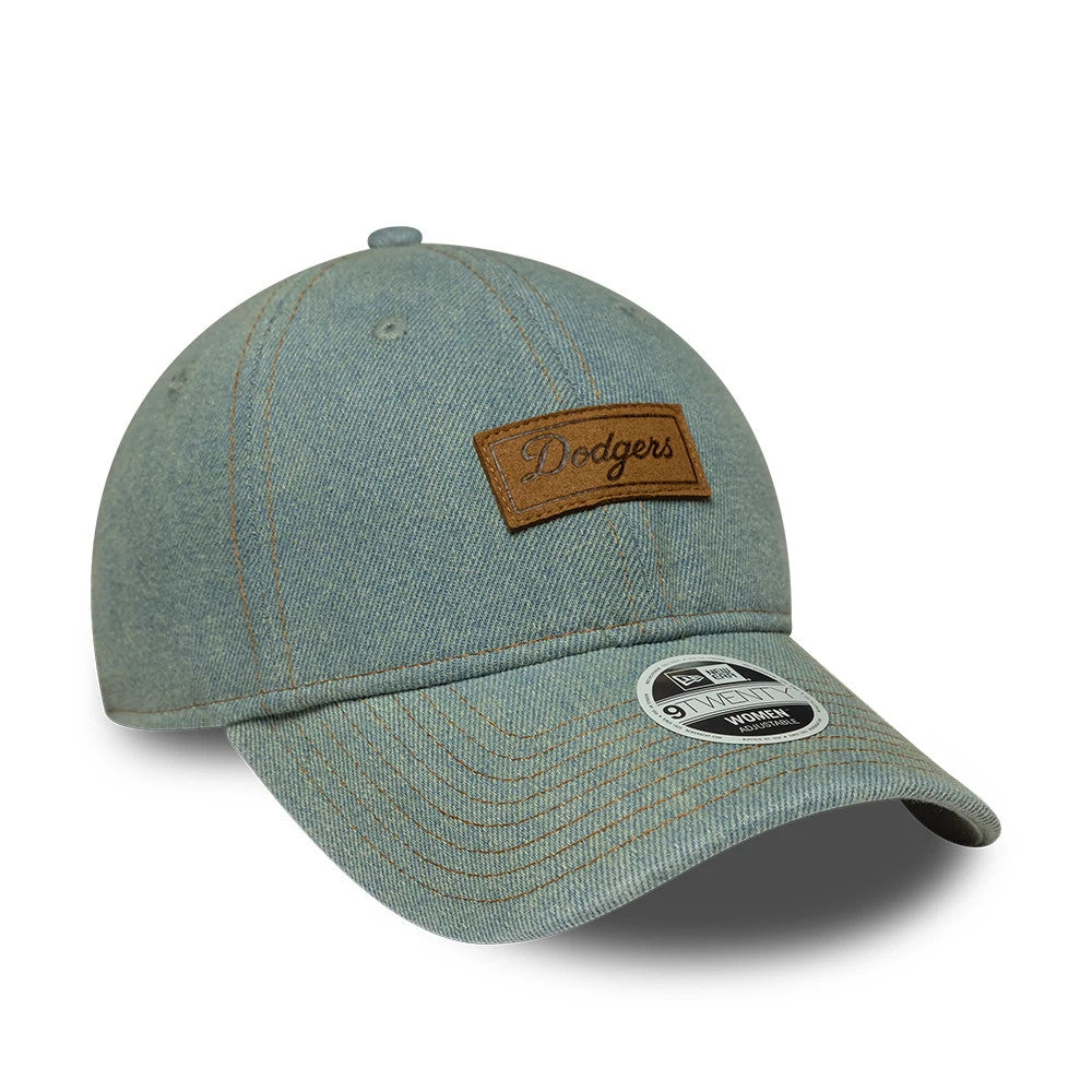 LA Dodgers Womens MLB Denim Pastel Blue New Era 9TWENTY Adjustable Cap, front view showing a brown leather-look Dodgers patch on the curved front panels, with contrasting tan stitching and a 9TWENTY size sticker on the denim visor.