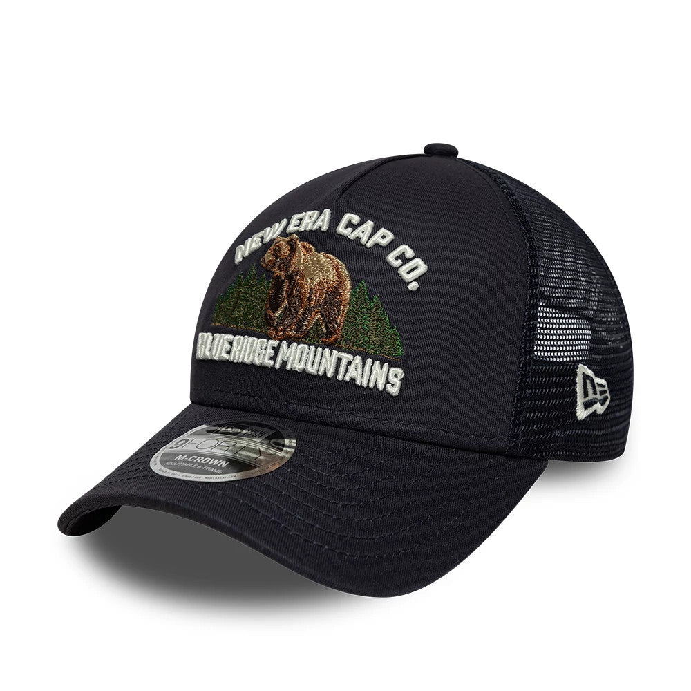 Pictured is this New Era Graphic 9FORTY M-Crown A-Frame Trucker cap in navy. 1