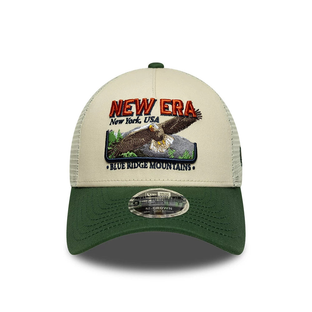 Pictured is this New Era Graphic 9FORTY M-Crown A-Frame Trucker cap in cream & green. 2