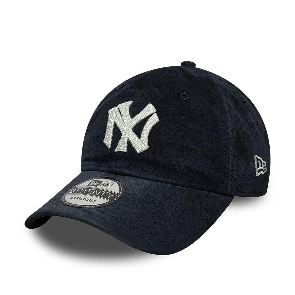 New York Yankees MLB Suede Navy New Era 9TWENTY Adjustable Cap, front view showing the raised white embroidered NY logo on the front panel, a curved navy visor with an attached 9TWENTY size sticker, and the New Era flag logo on the left side.