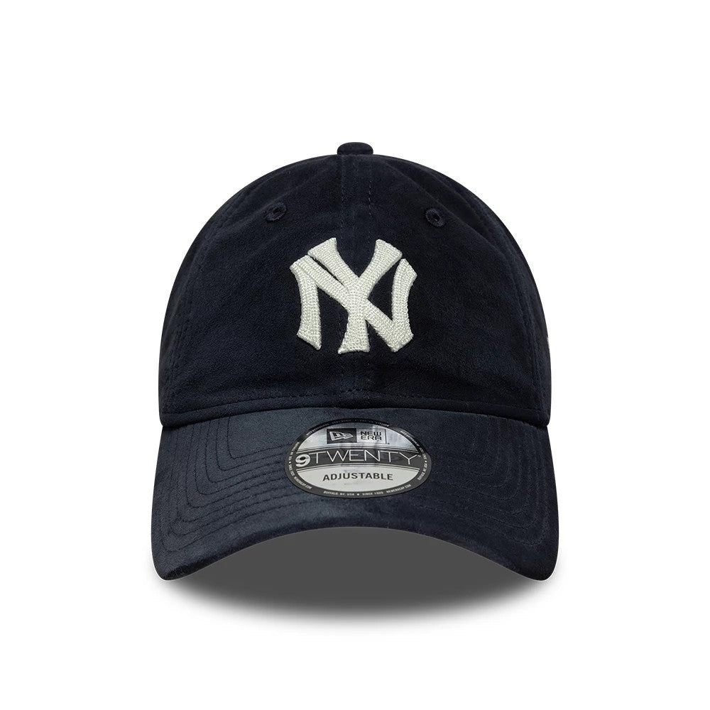 New York Yankees MLB Suede Navy New Era 9TWENTY Adjustable Cap, front view showing a white embroidered NY logo on the unstructured navy crown, with a matching navy curved visor and a 9TWENTY size sticker at the centre.