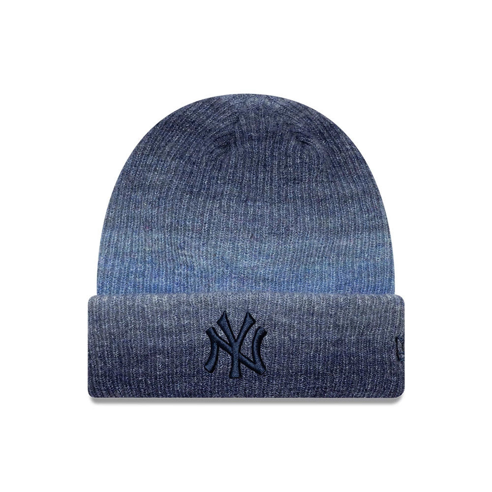 New Era New York Yankees Youth MLB Ombre Navy Cuff Knit Beanie Hat, front view showing a raised embroidered navy NY logo centred on the cuff, set against a gradient ombre knit transitioning from dark to light navy.