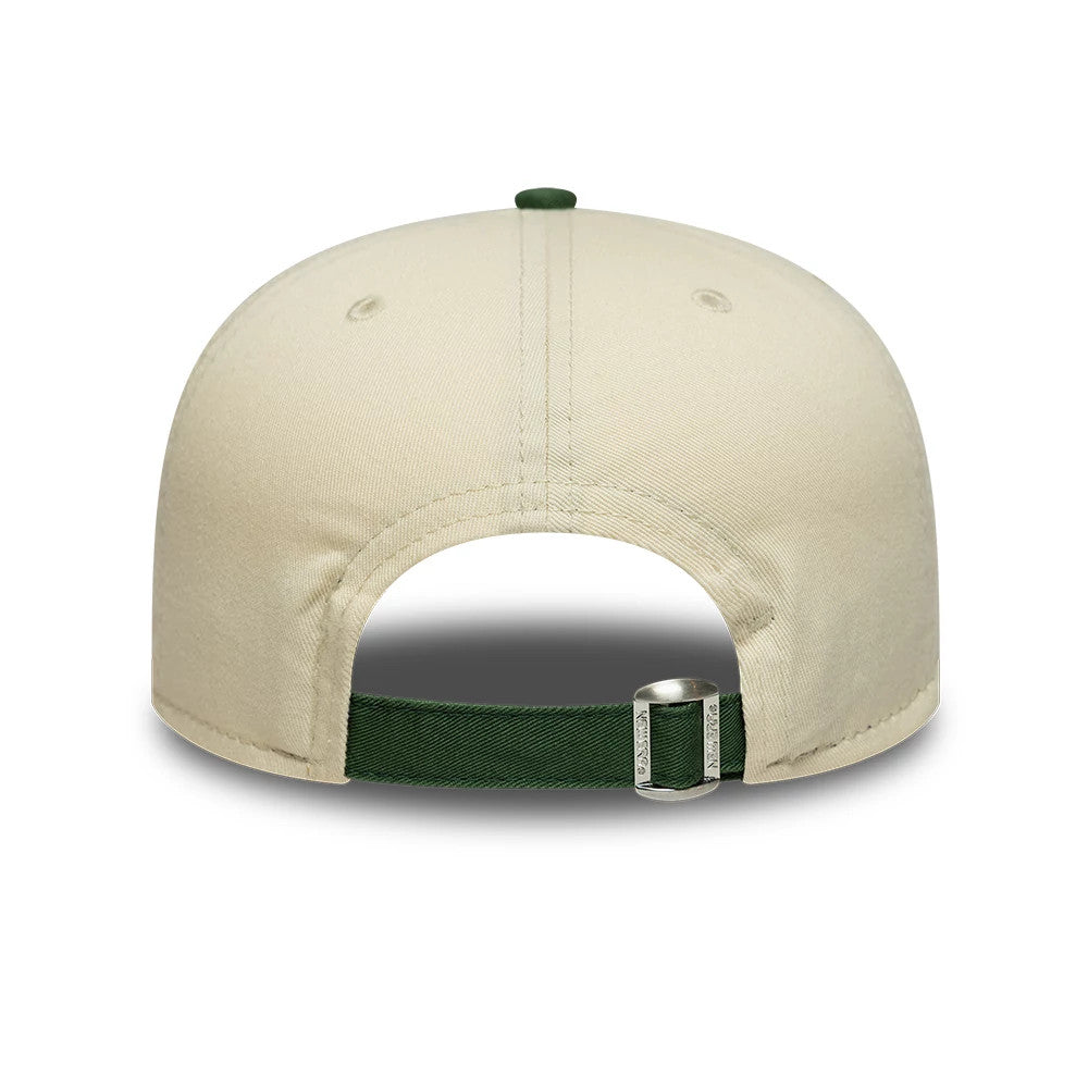 New Era Washed Graphic Cream & Green 19TWENTY Adjustable Cap, rear view showing a cream-coloured crown with matching eyelets and a green top button, featuring an adjustable green strap with a buckle closure at the back.