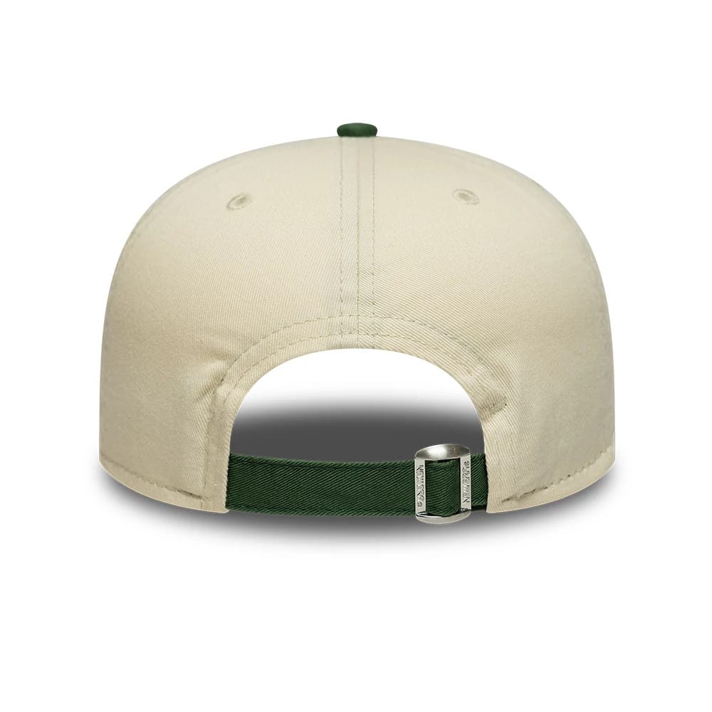 Pictured is this New Era Washed Graphic 19TWENTY cap in cream & green. 4