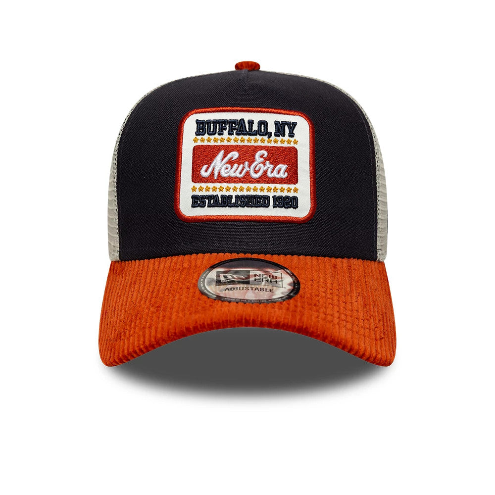 Pictured is this New Era Patch Cord 9FORTY A-Frame Trucker cap in navy & red. 2