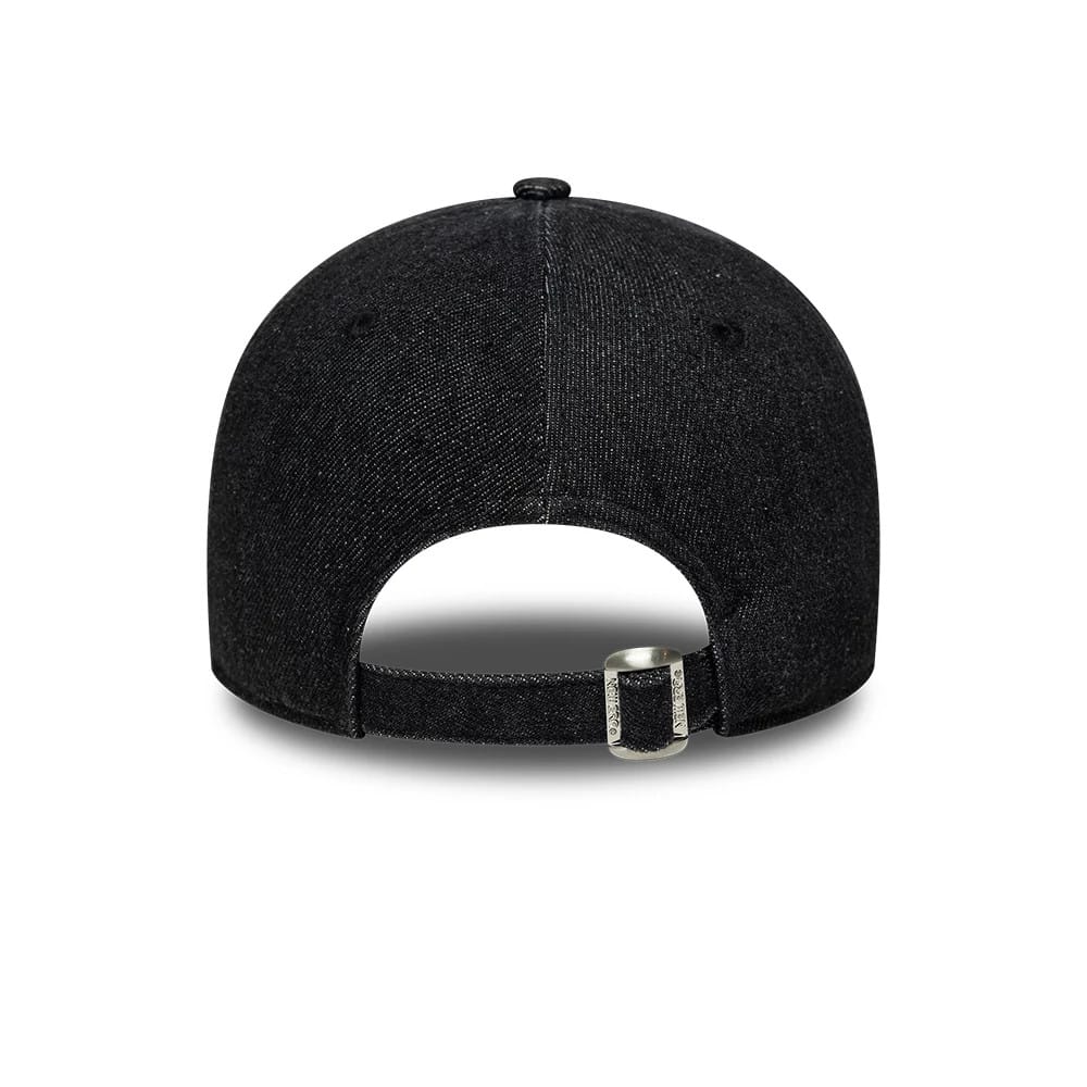 New Era Denim Black 9FORTY Adjustable Cap, rear view showing the black denim fabric with a curved visor, featuring a strap closure with a silver buckle and a contoured six-panel crown without logos or embroidery.