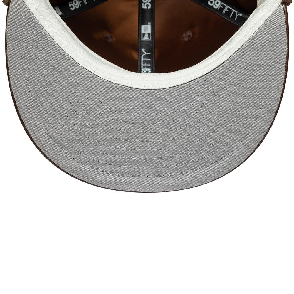 Pictured is this MLB Leather New York Yankees Dogear 59FIFTY Fitted cap in brown. 3
