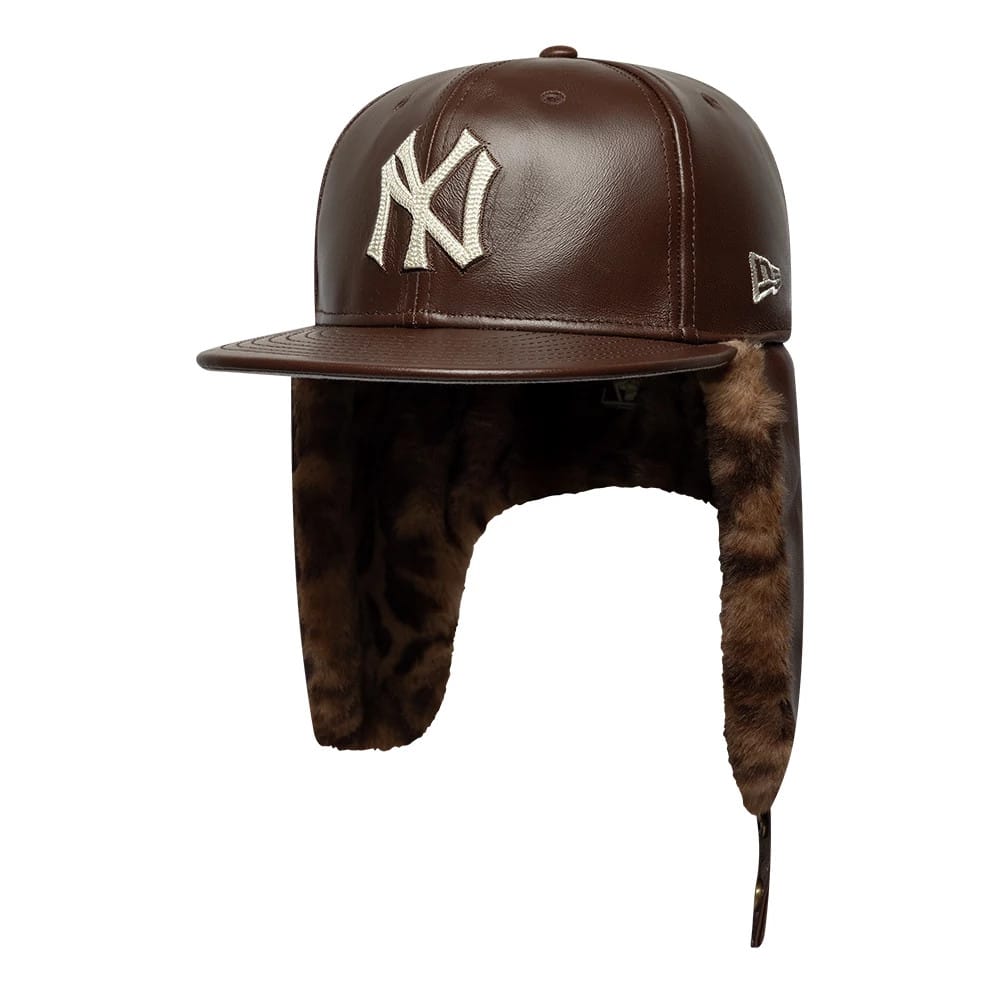 Pictured is this MLB Leather New York Yankees Dogear 59FIFTY Fitted cap in brown. 2