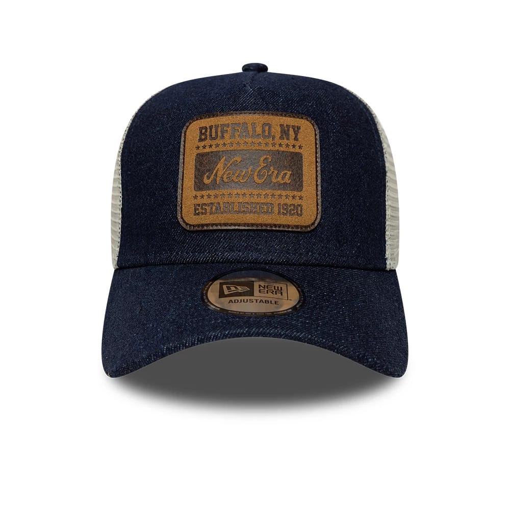 Pictured is this New Era Patch Denim 9FORTY A-Frame Trucker cap in dark blue. 2