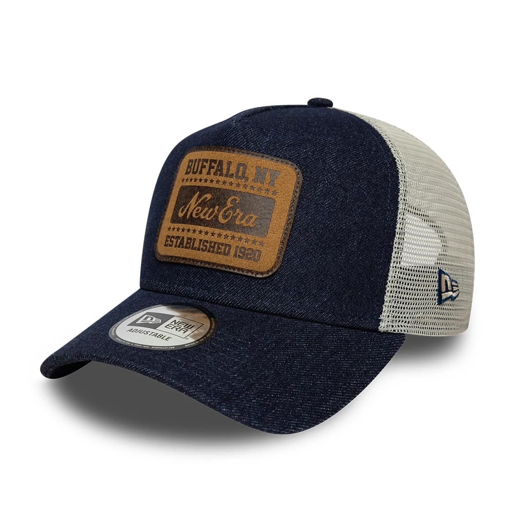 Pictured is this New Era Patch Denim 9FORTY A-Frame Trucker cap in dark blue. 1