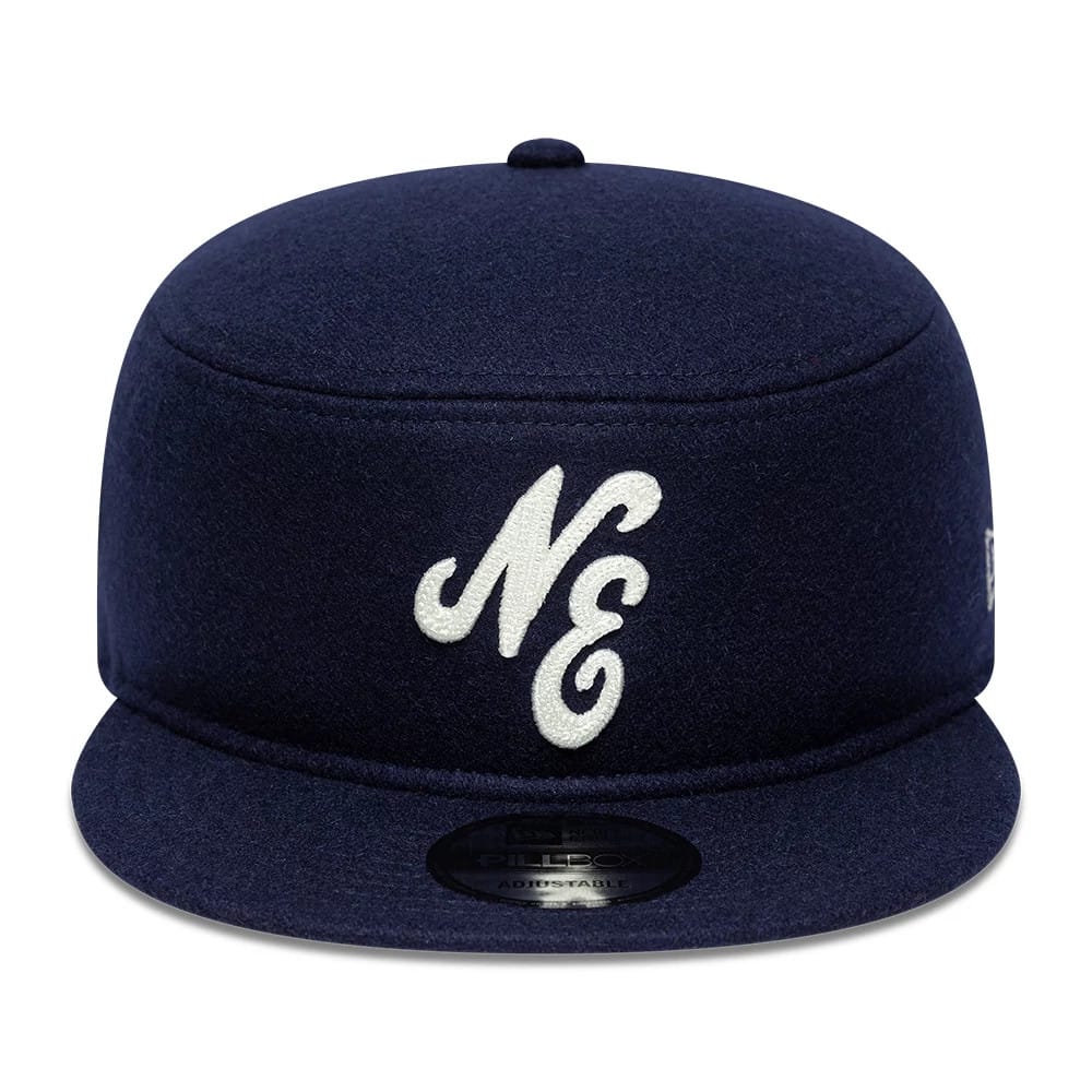 Pictured is this New Era Pin Pillbox Adjustable cap in navy. 2