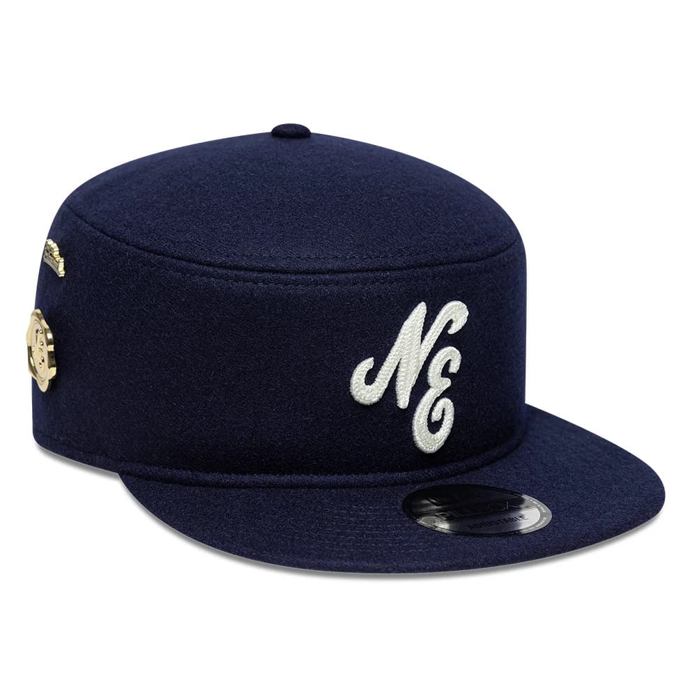 Pictured is this New Era Pin Pillbox Adjustable cap in navy. 1