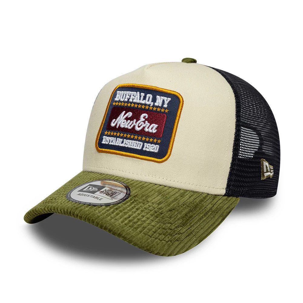 Pictured is this New Era Patch Cord 9FORTY A-Frame Trucker cap in cream & green. 1