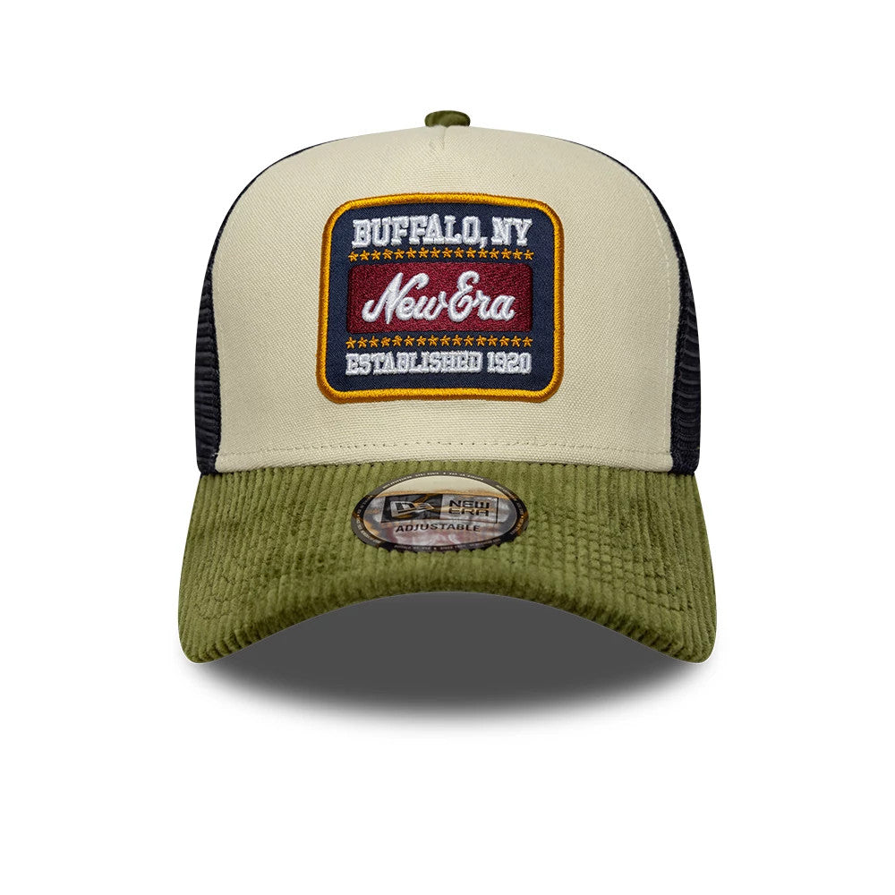 Pictured is this New Era Patch Cord 9FORTY A-Frame Trucker cap in cream & green. 2