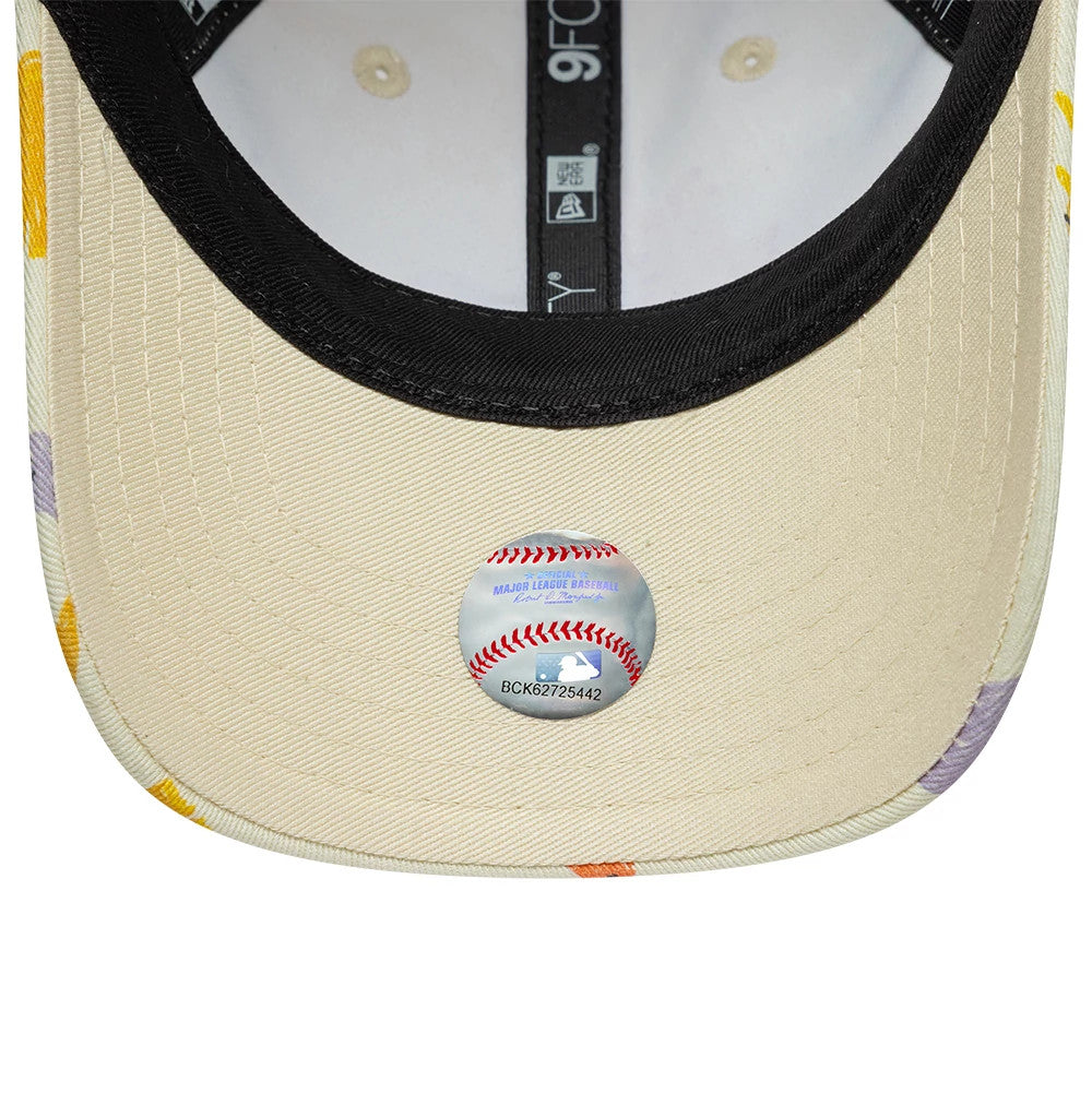 Pictured is this Toddler New Era All Over Dino 9FORTY cap in cream. 5