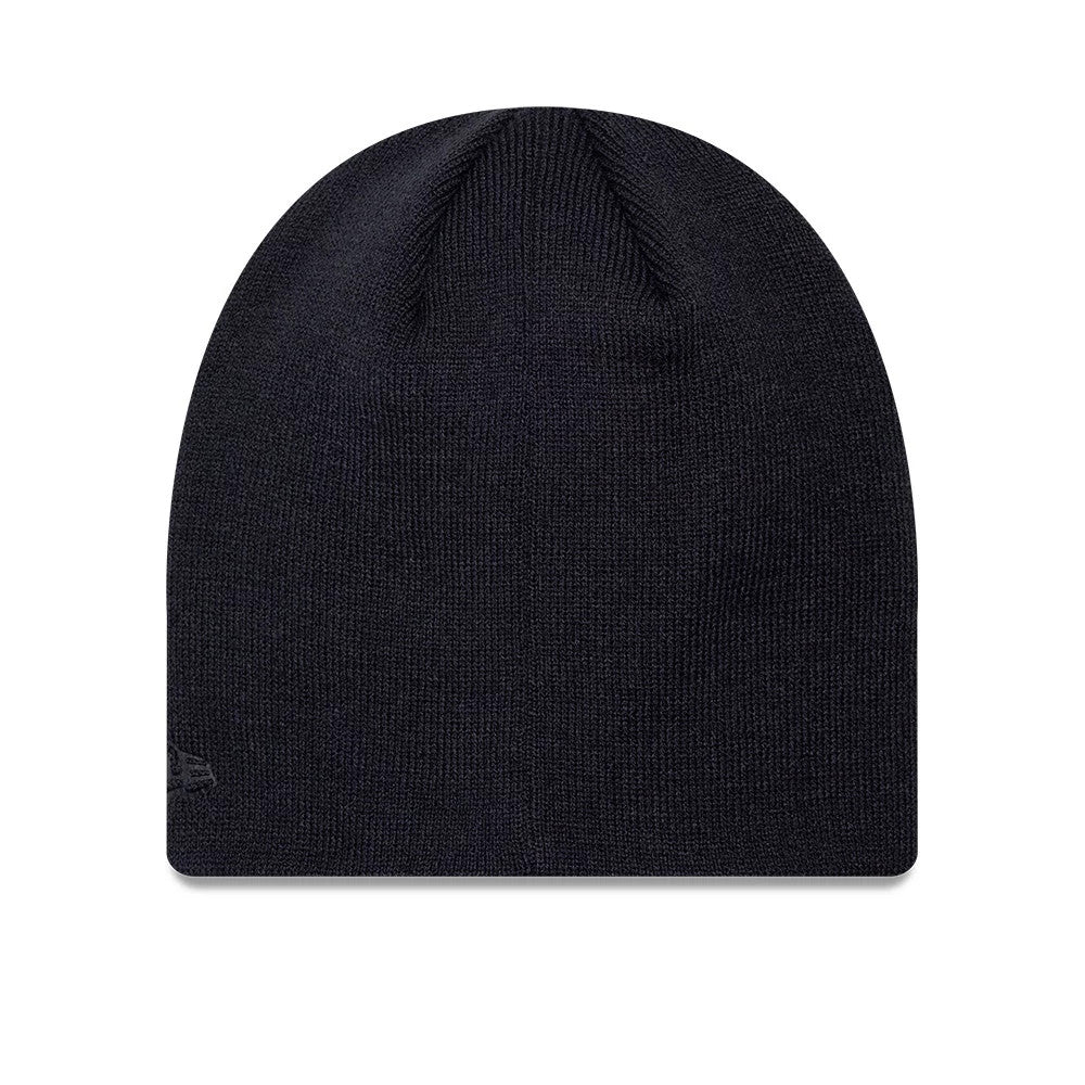 New Era New York Yankees MLB Script Navy Skull Knit Beanie Hat, front view showing a clean, minimalistic navy knit design with no logos, featuring a seamless crown and a New Era flag logo embroidered on the left side.