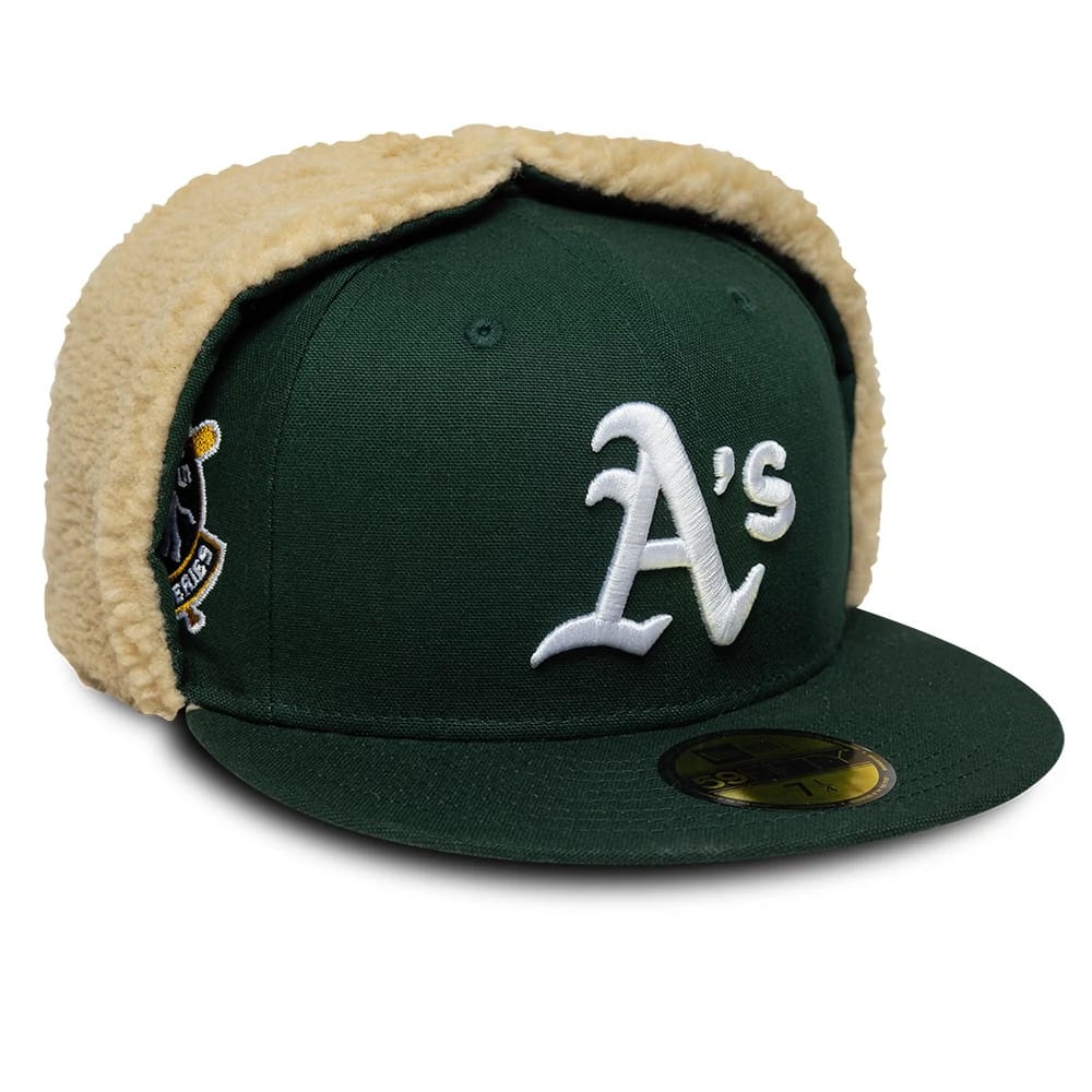 Pictured is this MLB World Series Athletics Dogear 59FIFTY Fitted cap in dark green. 1