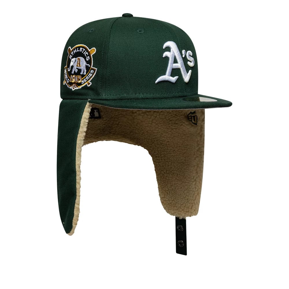 Pictured is this MLB World Series Athletics Dogear 59FIFTY Fitted cap in dark green. 2