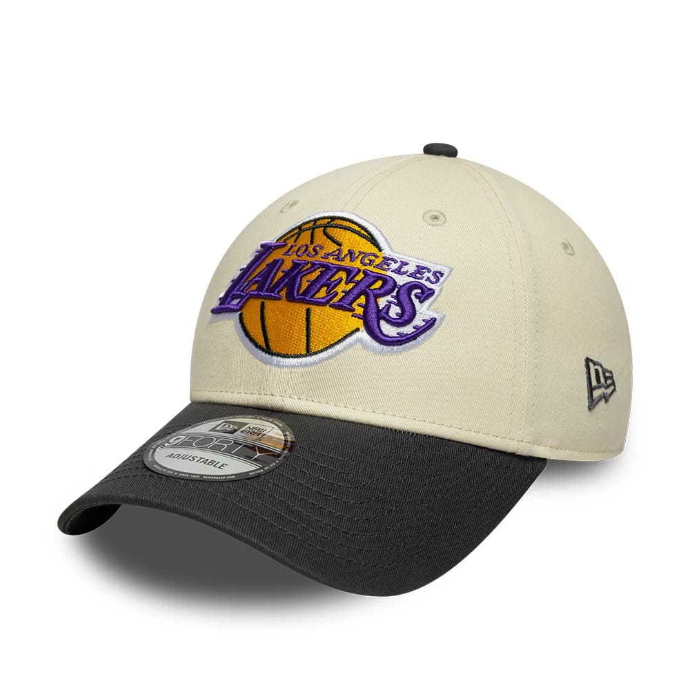 Pictured is this NBA Colourblock LA Lakers 9FORTY cap in cream & black. 1