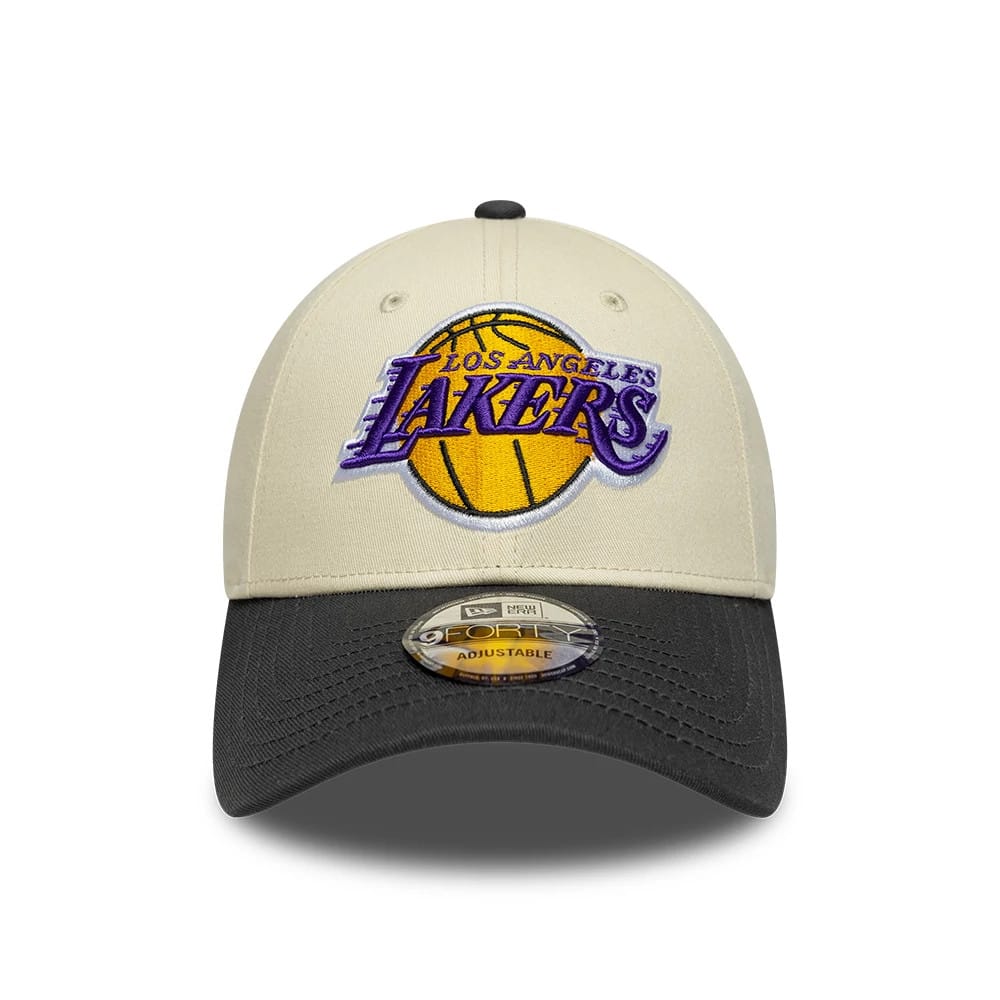 Pictured is this NBA Colourblock LA Lakers 9FORTY cap in cream & black. 2