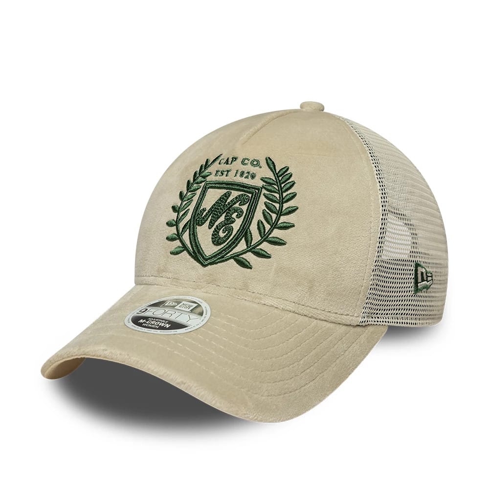 Pictured is this Womens New Era Velour 9FORTY M-Crown A-Frame Trucker cap in cream. 1