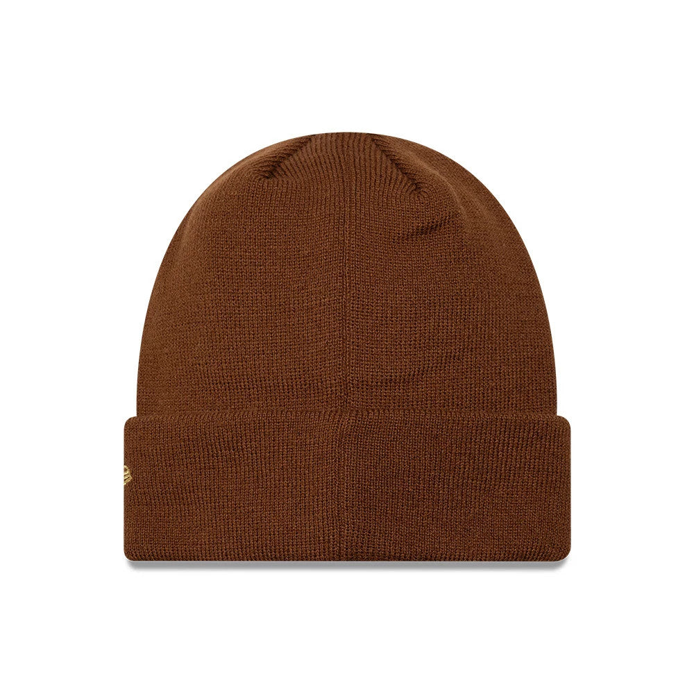New Era New York Yankees Womens MLB Metallic Logo Brown Cuff Knit Beanie Hat, front view showing a plain brown knit with a fold-over cuff, featuring a logo detail on the side, creating a classic and understated look.