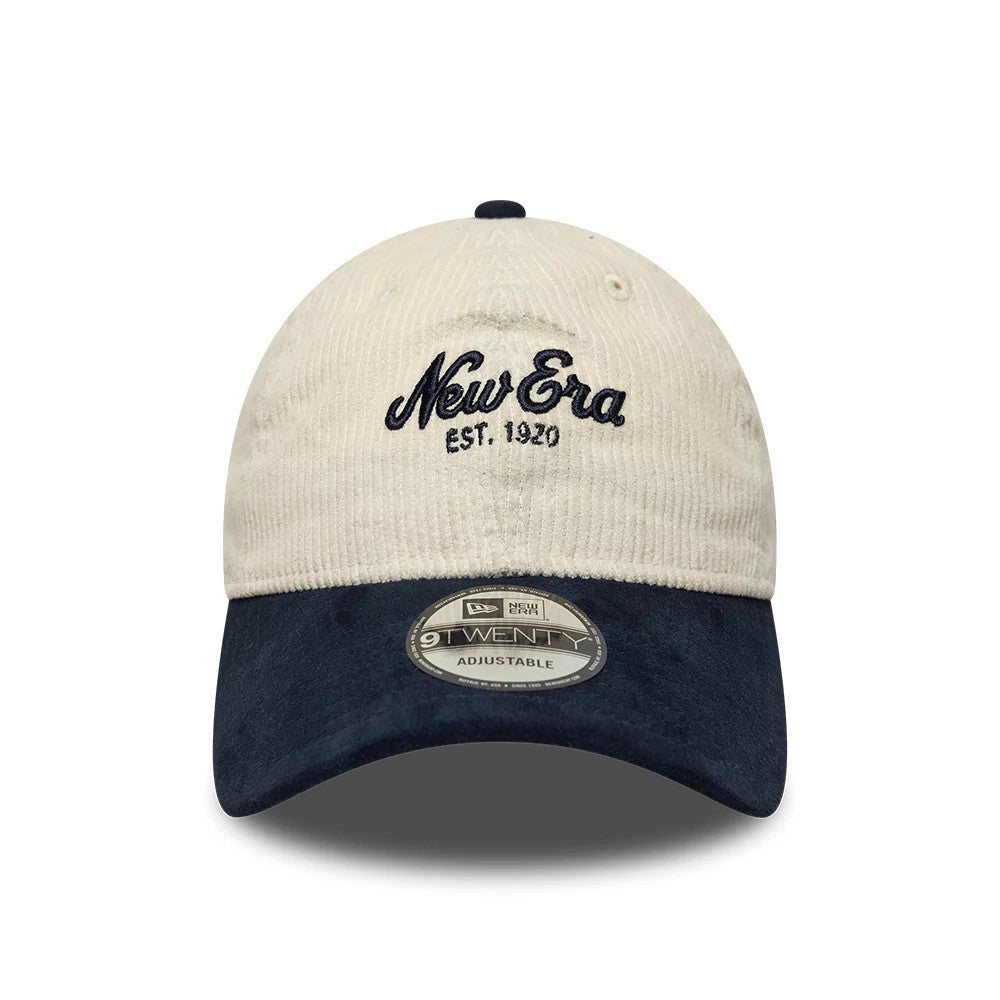 New Era Cord Mix Cream & Navy 9TWENTY Adjustable Cap, front view showing navy embroidered New Era Est. 1920 logo on the cream crown, with a contrasting navy visor and a silver 9TWENTY size sticker on the visor's top.