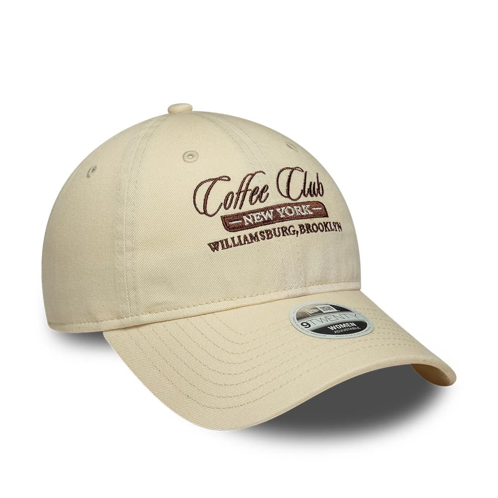 Pictured is this Womens New Era Café Slogan 9TWENTY cap in cream. 3