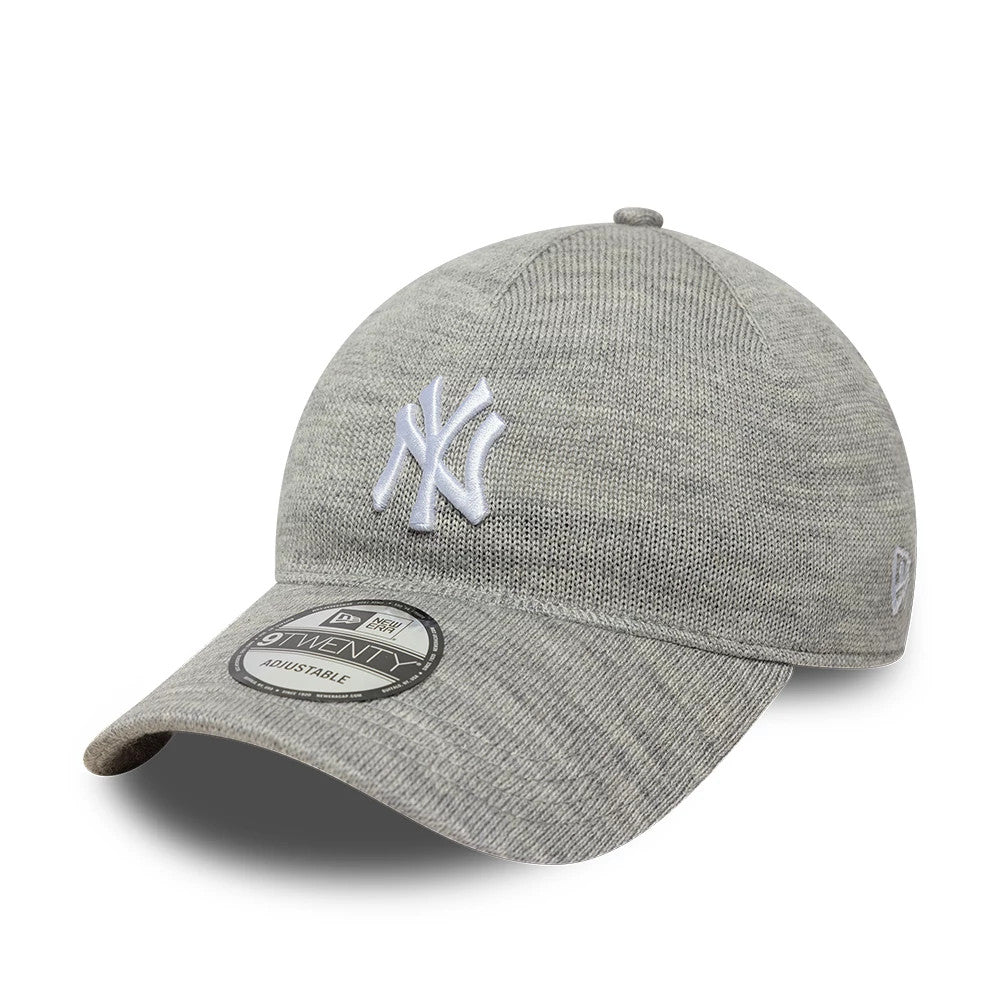 New York Yankees MLB Knitted Grey New Era 9TWENTY A-Frame Adjustable Cap, three-quarter view showing the raised white embroidered NY logo on the front panel, grey curved visor with a 9TWENTY size sticker, and New Era flag logo on the left side.