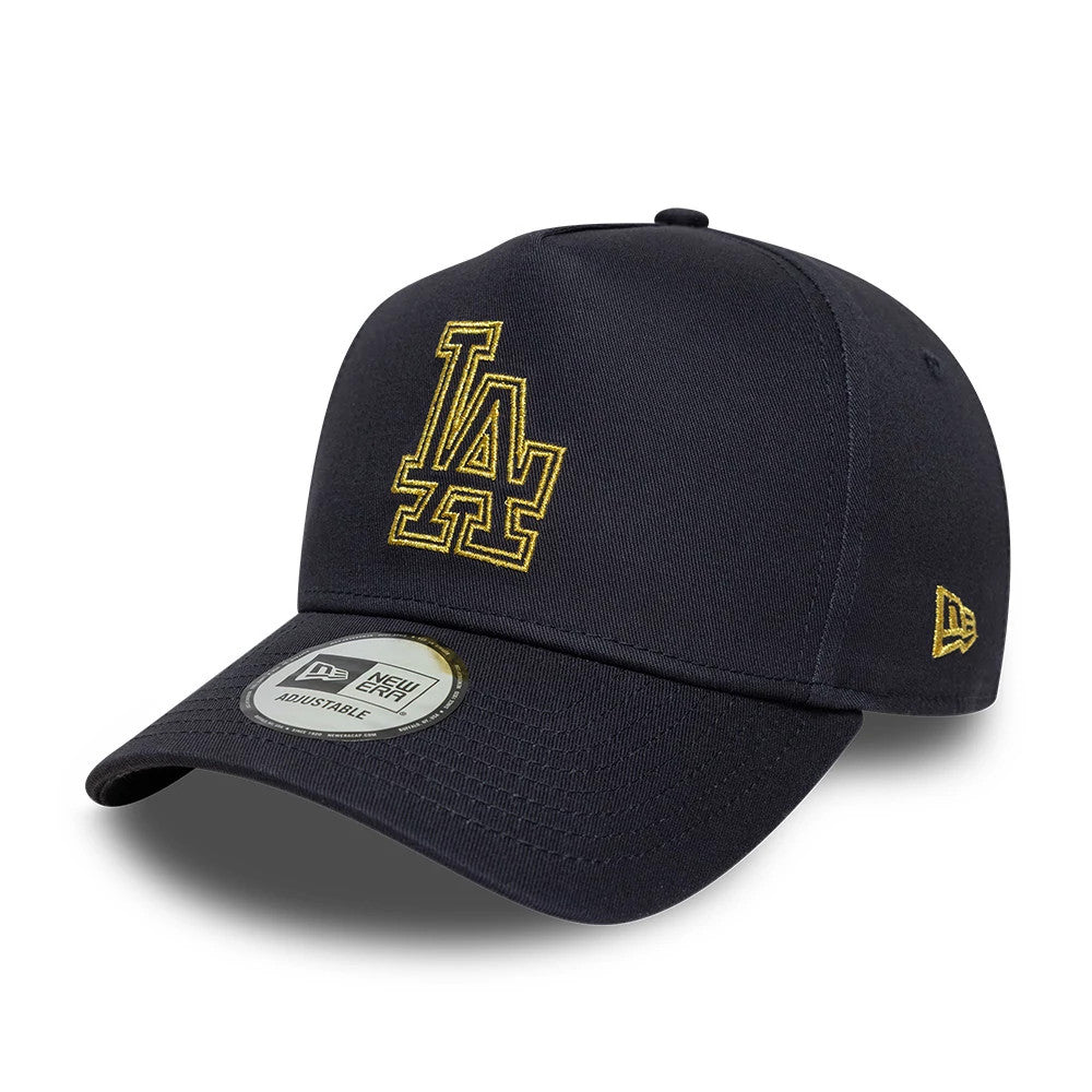 LA Dodgers MLB Metallic Outline Navy New Era 9FORTY A-Frame Adjustable Cap, three-quarter view showing a gold embroidered LA logo on the navy front panel, curved visor with a New Era 9FORTY size sticker, and the New Era flag logo on the left side.