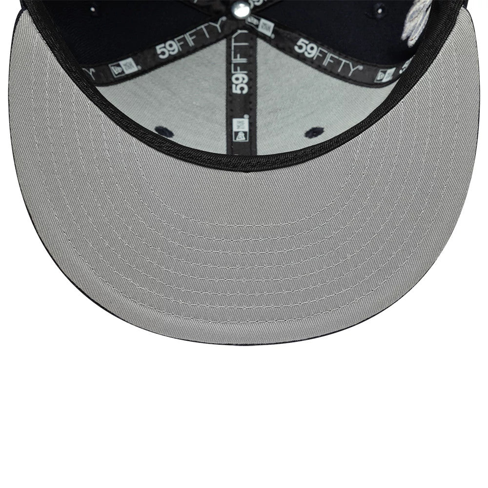 Pictured is this New Era Heritage Script 59FIFTY Fitted cap in navy. 2