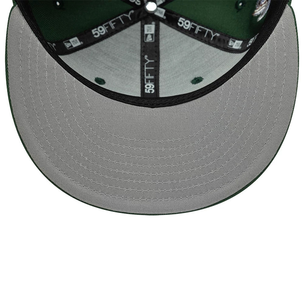 Pictured is this New Era Heritage Script 59FIFTY Fitted cap in dark green. 2