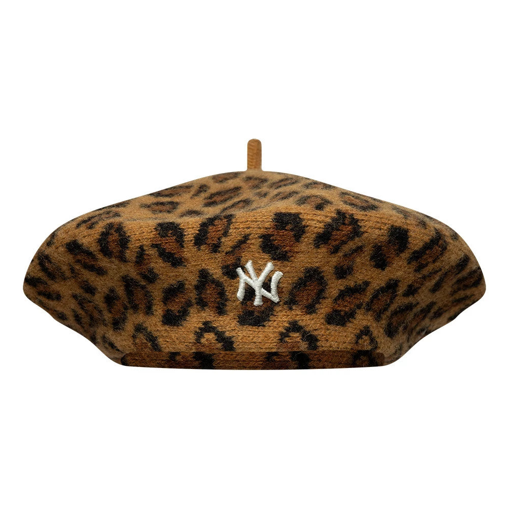New Era New York Yankees MLB Leopard Beige Beret, front view showing a beige beret with a leopard print pattern, featuring the white embroidered NY Yankees logo centred on the front, with a classic stem on top.