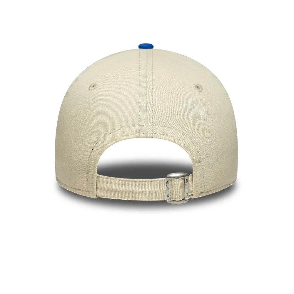 Youth Yankees MLB League Essential Cream & Blue New Era 9FORTY Adjustable Cap, rear view showing the silver buckle on the cream adjustable strap, highlighted by the blue top button and embroidered eyelets on the structured crown.
