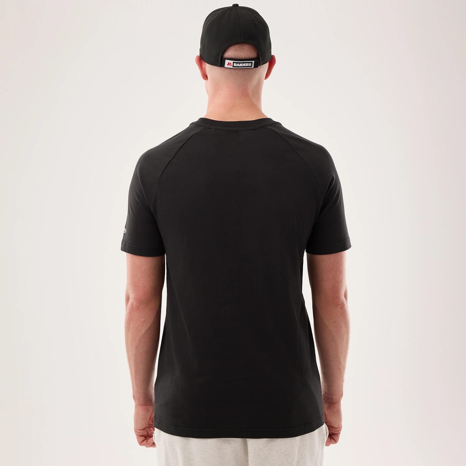 The model is wearing this NFL Sideline 2026 Las Vegas Raiders T-Shirt in black. 2