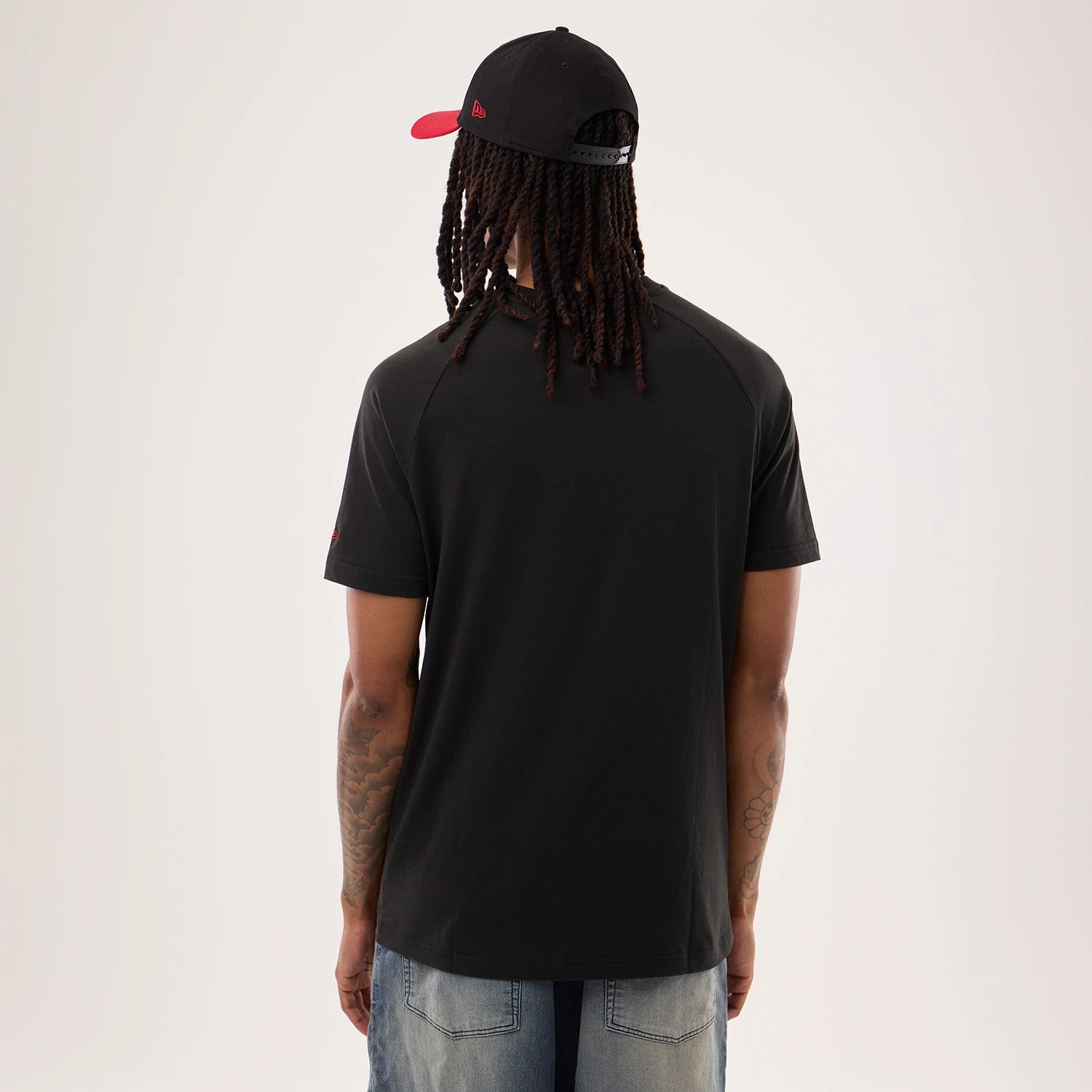 The model is wearing this NFL Sideline 2026 San Francisco 49ers T-Shirt in black. 2