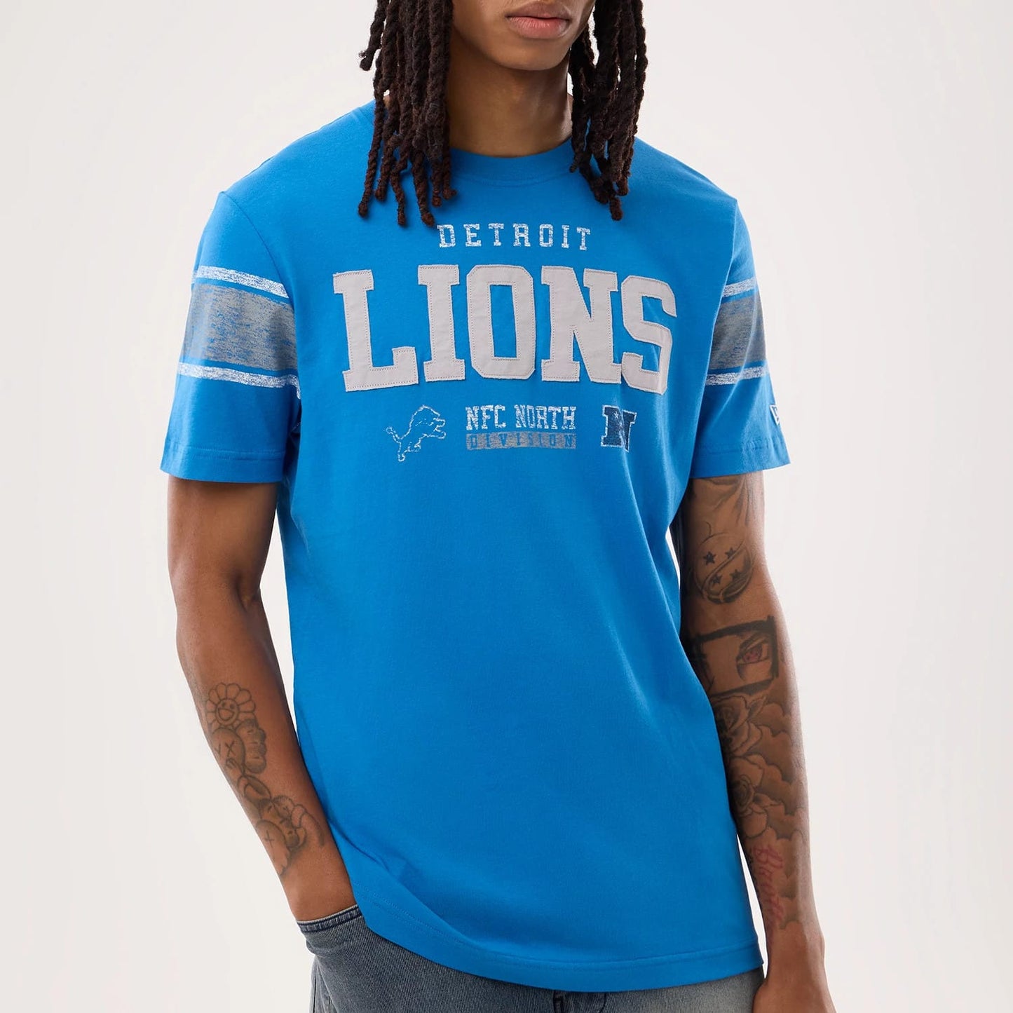 The model is wearing this NFL Sideline 2026 Detroit Lions T-Shirt in blue. 7