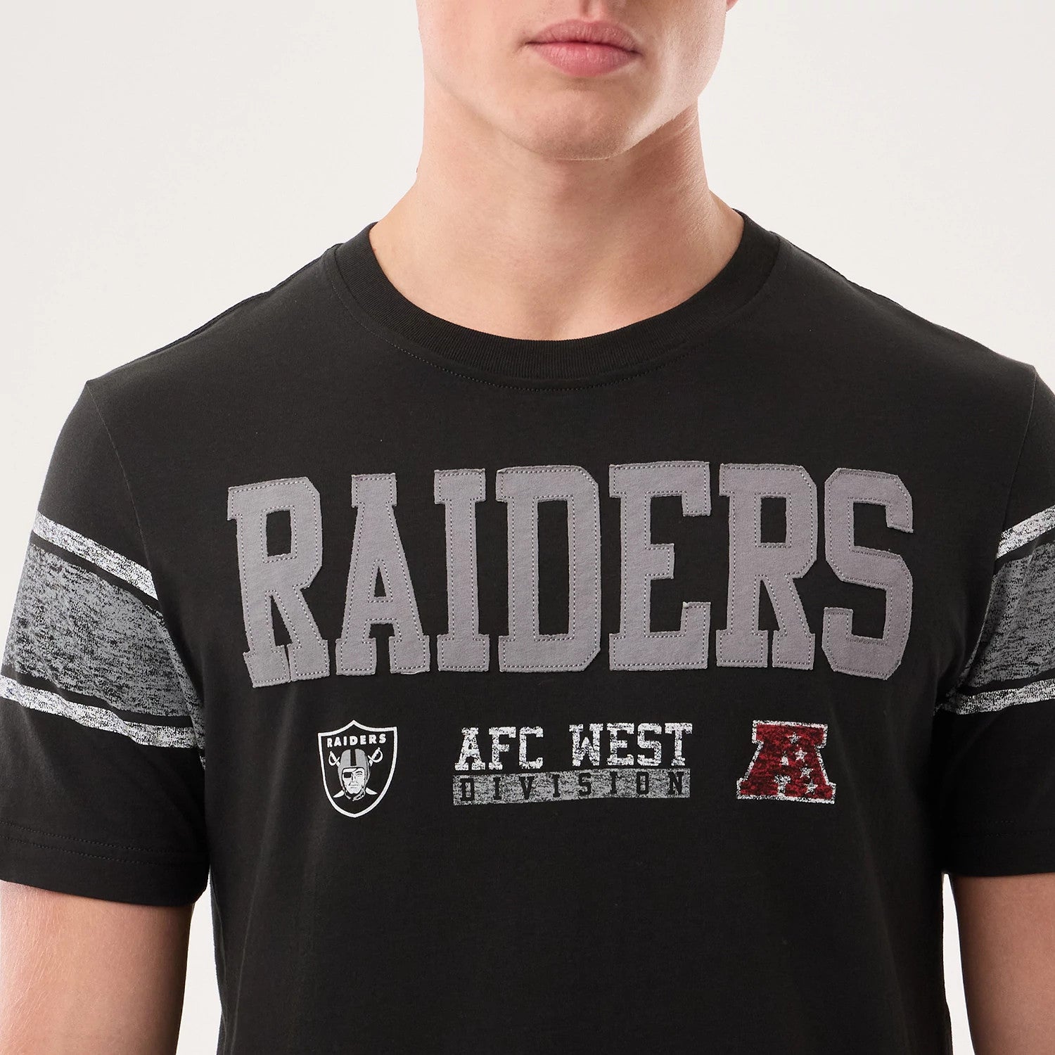 The model is wearing this NFL Sideline 2026 Las Vegas Raiders T-Shirt in black. 3