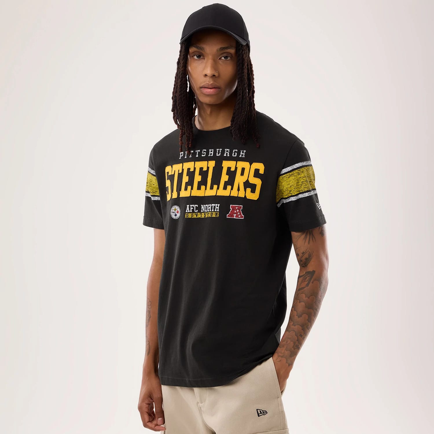 The model is wearing this NFL Sideline 2026 Pittsburgh Steelers T-Shirt in black. 1