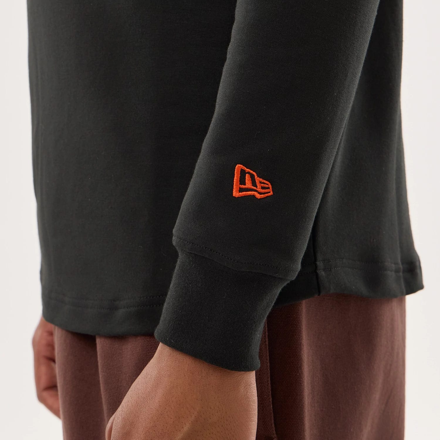 The model is wearing this NFL Sideline 2026 Chicago Bears Double Sleeve Hoodie in black. 4