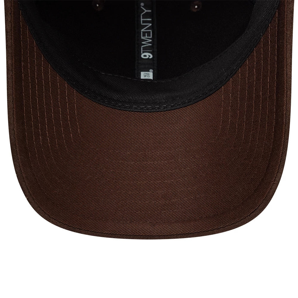 Womens New Era Textured Dark Brown 9TWENTY Adjustable Cap, inside view showing the dark brown curved visor with prominent stitching, black sweatband, and dark brown interior panels, with a centred 9TWENTY label underneath the crown.